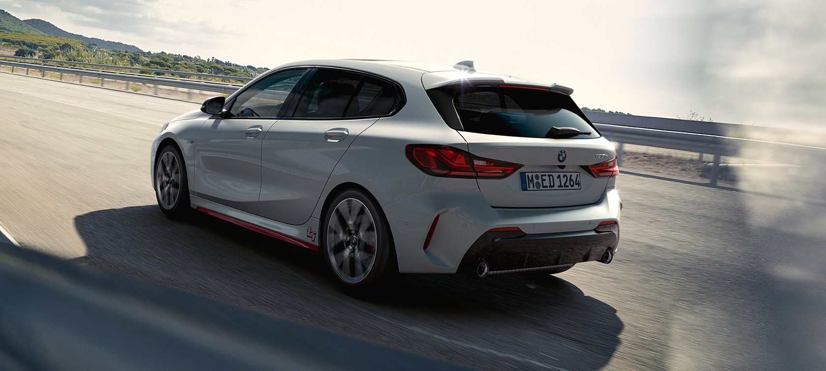 BMW Serija 128ti F40, tročetvrtinski zadnji prikaz BMW Serija 128ti F40, tročetvrtinski zadnji prikaz vozila u pokretu