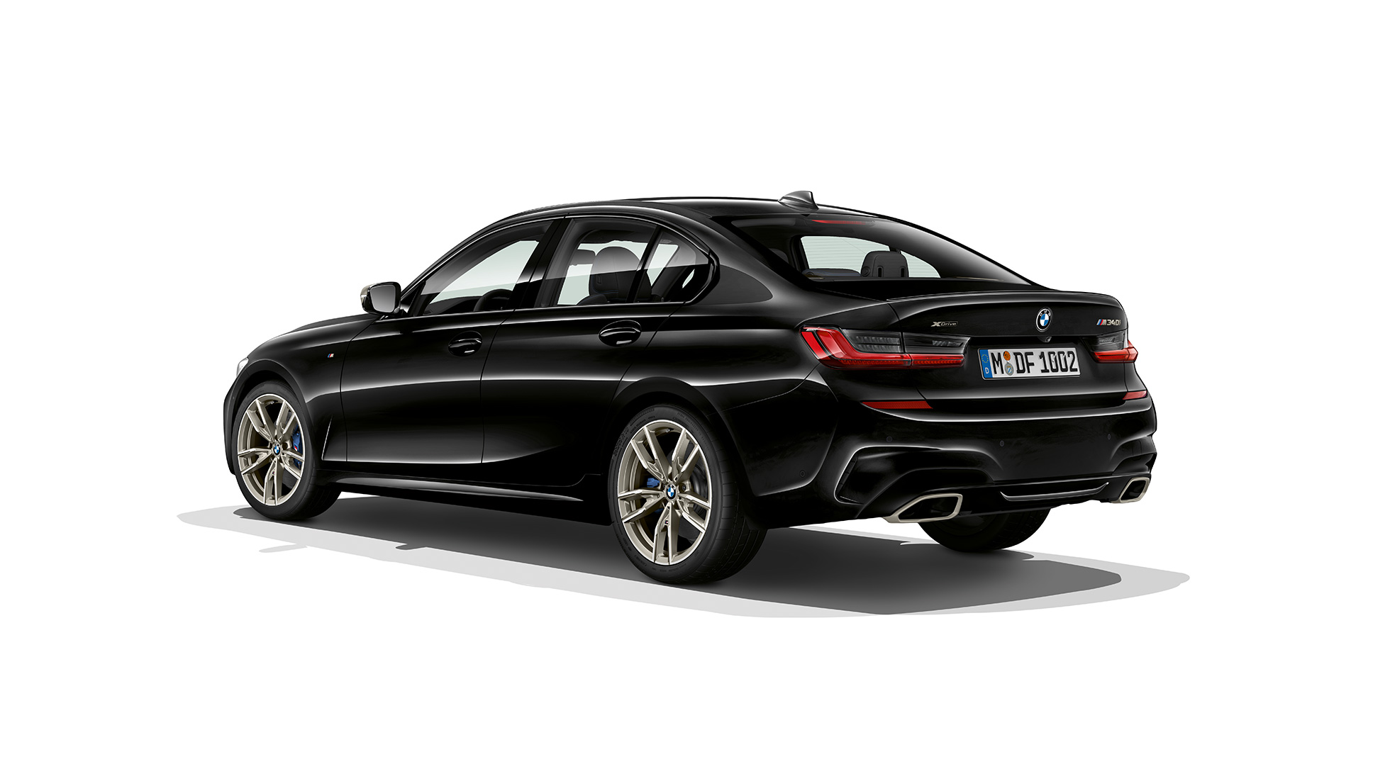 BMW Serije 3 Sedan, pozadina modela M340i xDrive. Tročetvrtinski zadnji pogled na BMW Serije 3 M340i xDrive Sedan.