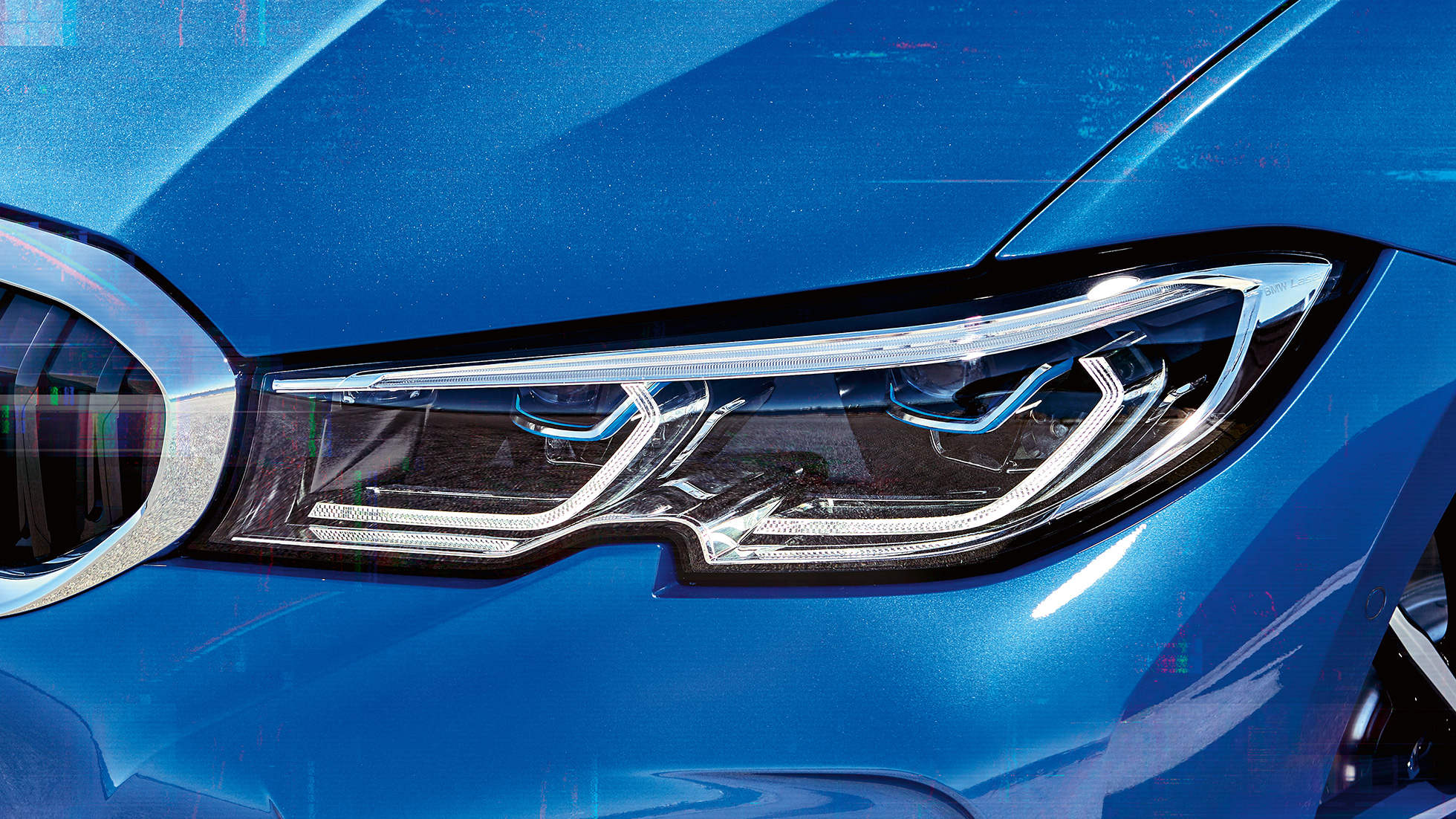 BMW Serije 3 Sedan, BMW lasersko svetlo. Bočni snimak izbliza desnog prednjeg fara sa BMW laserskim svetlom.