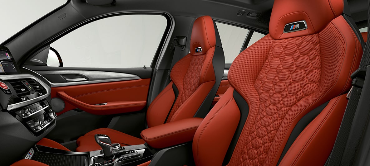 BMW X4 M, sportska sedišta in leather 'Merino' Sakhir Orange. BMW X4 M, enterijer, sportska sedišta u koži 'Merino' Sakhir Orange.