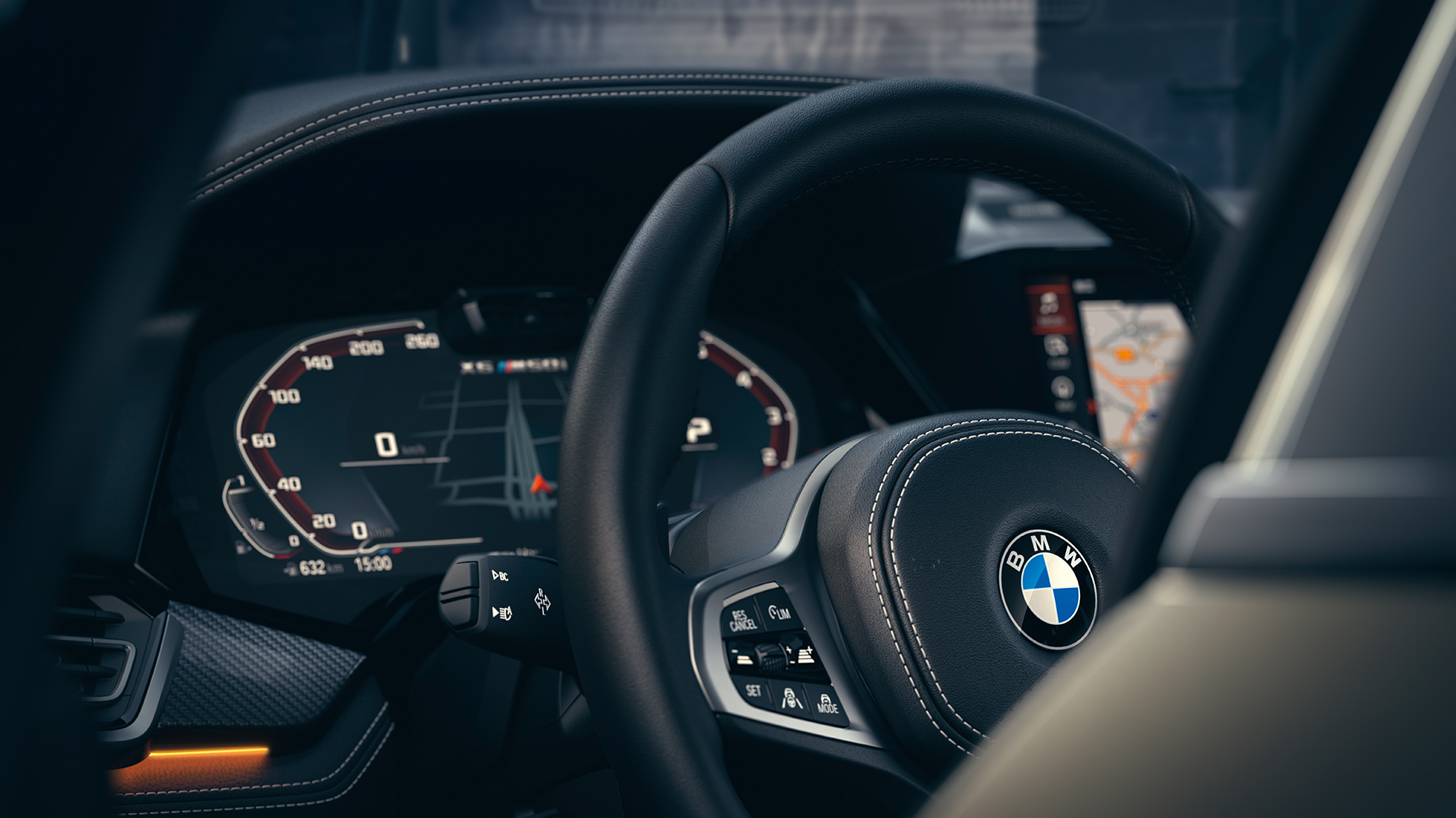 BMW sistemi asistencije. Pogled izbliza na BMW enterijer sa fokusom na instrrument tablu.