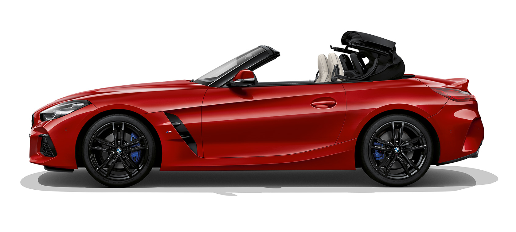 Bočni snimak BMW-a Z4 Roadster (G29) Bočni snimak BMW-a Z4 Roadster (G29) tokom otvaranja krova