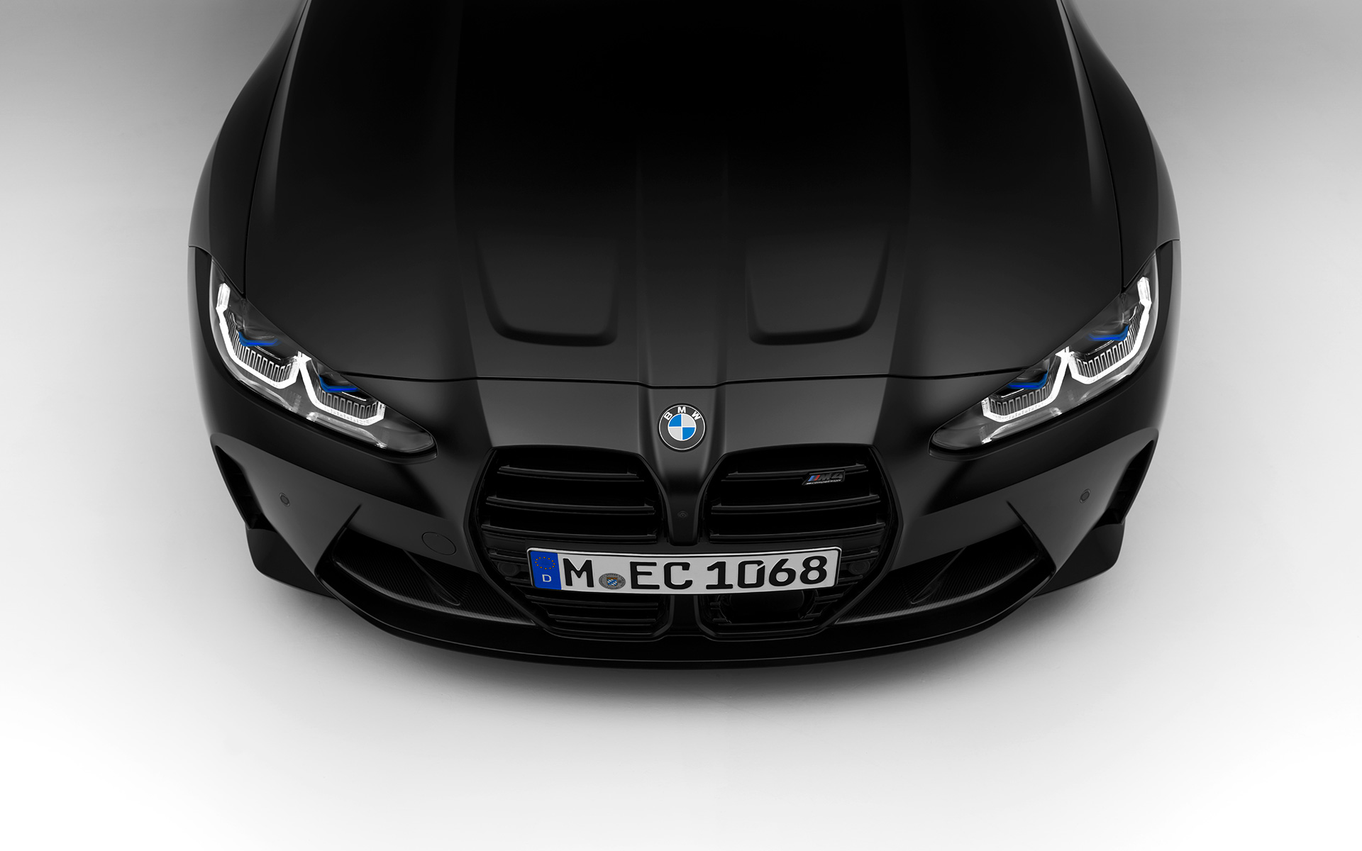 BMW M4 Competition Coupé G82 2021 BMW Individual Frozen Black metalik prednji prikaz BMW M4 Competition Coupé G82 2021 BMW Individual Frozen Black metalik prednji prikaz u mirovanju